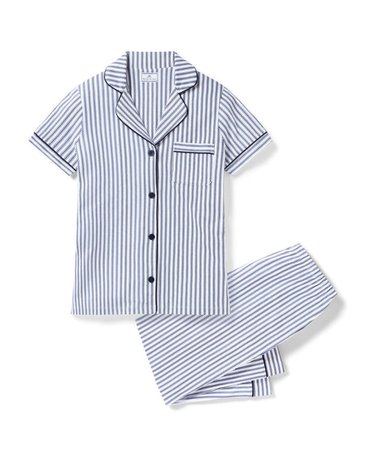 Navy and white striped pajama set on a white background | Lead