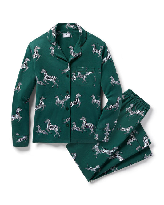 Green pajama set with zebra pattern on a white background | Lead