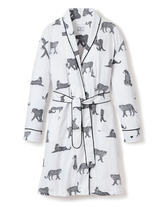 White robe with black animal print on a white background