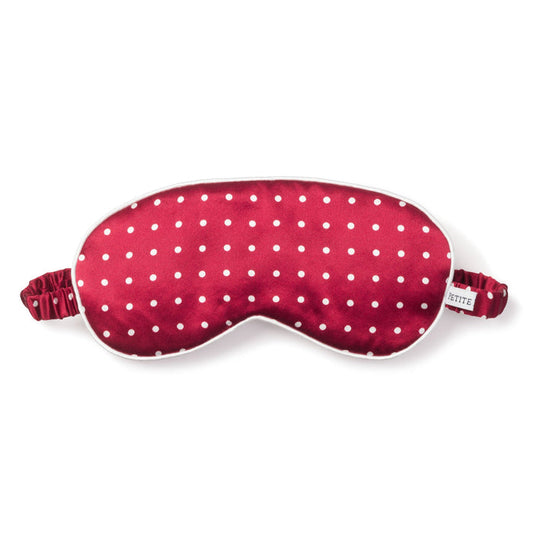 Red sleep mask with white polka dots on a white background | Lead