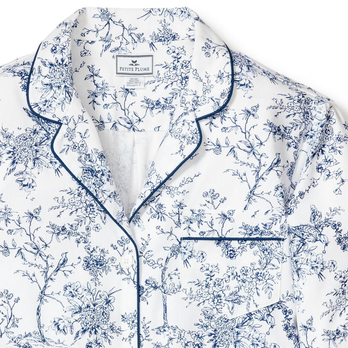 Floral pajama set with blue details on a white background
