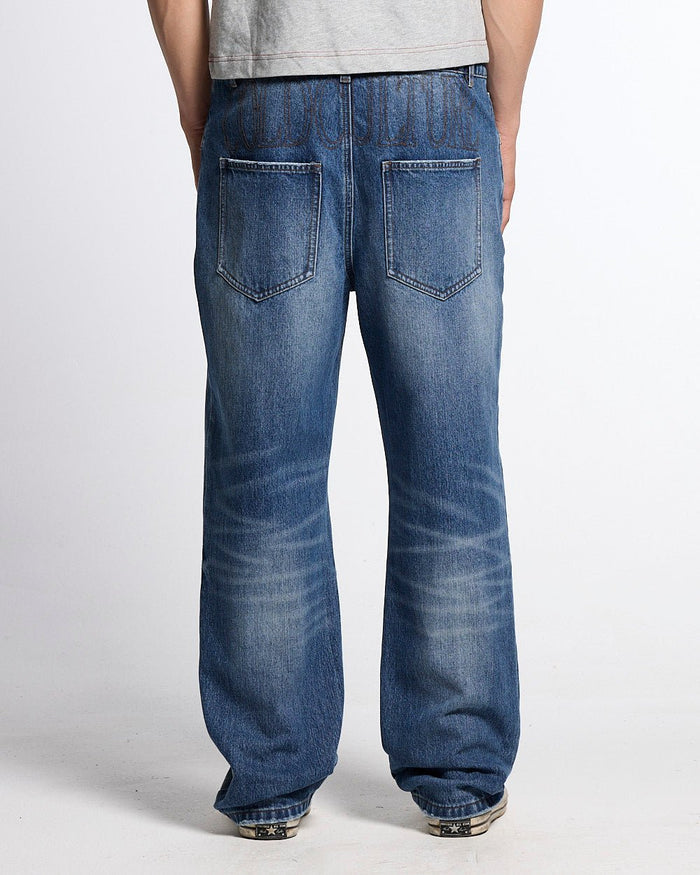 REVERSED V1 REGULAR PANTS MEDIUM DENIM - medium blue denim pants, back view on male model - Cold Culture