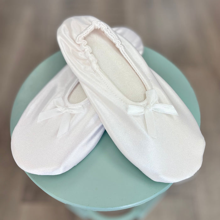 White satin padded slippers.