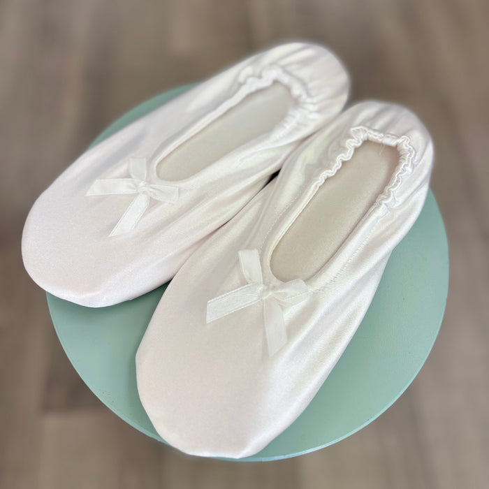 White satin padded slippers.