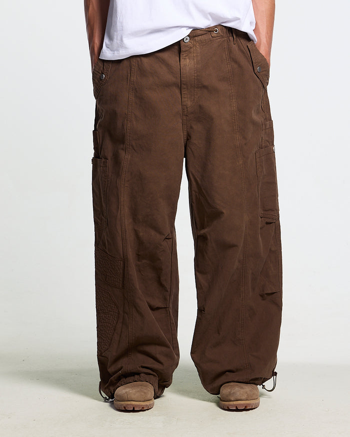 SOLID CARGO PANTS BROWN - brown cargo pants, front view on male model - Cold Culture