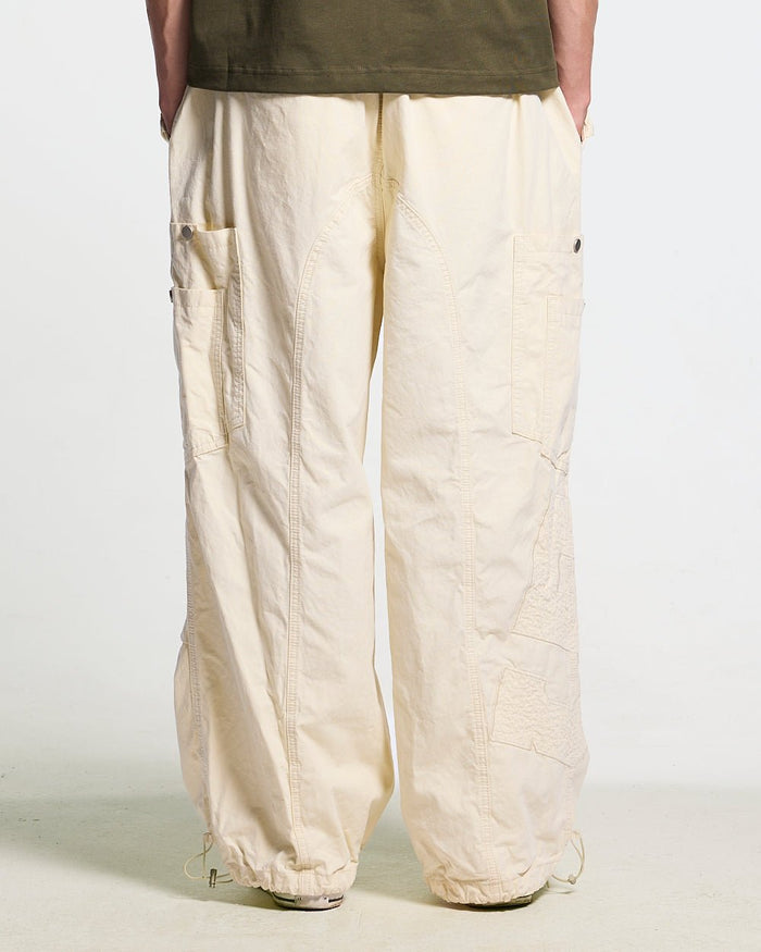 SOLID CARGO PANTS WHITE - off-white cargo pants, back view on male model - Cold Culture