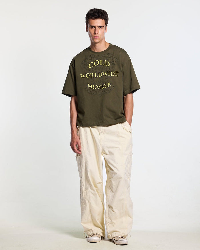 SOLID CARGO PANTS WHITE - off-white cargo pants, front view on male model - Cold Culture