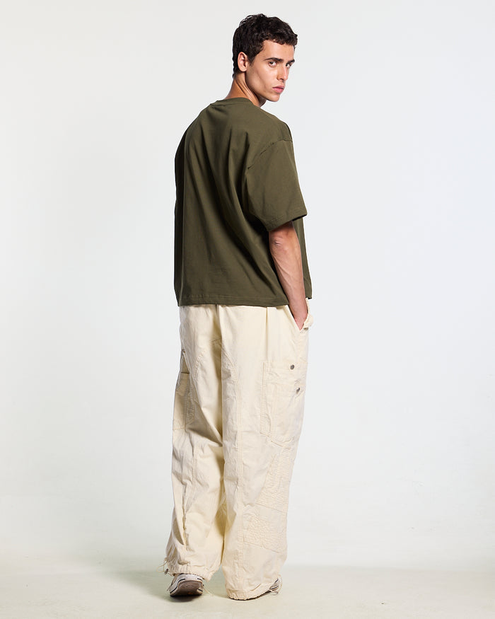SOLID CARGO PANTS WHITE - off-white cargo pants, back view on male model - Cold Culture