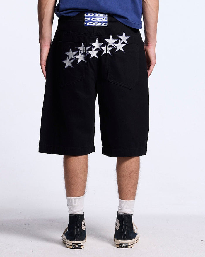STARS V2 SHORTS BLACK - black baggy denim shorts, back view on male model - Cold Culture