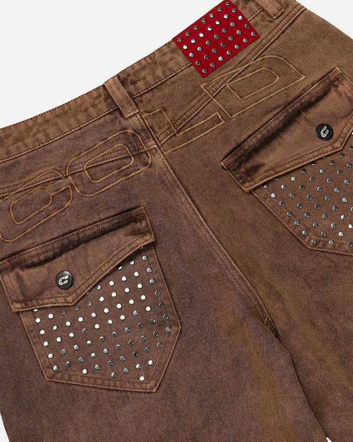STUDS SHORT BROWN - brown studded denim shorts, detail close-up - Cold Culture