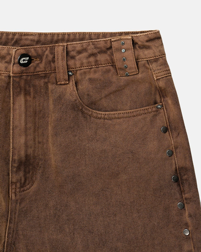 STUDS SHORT BROWN - brown studded denim shorts, detail close-up - Cold Culture