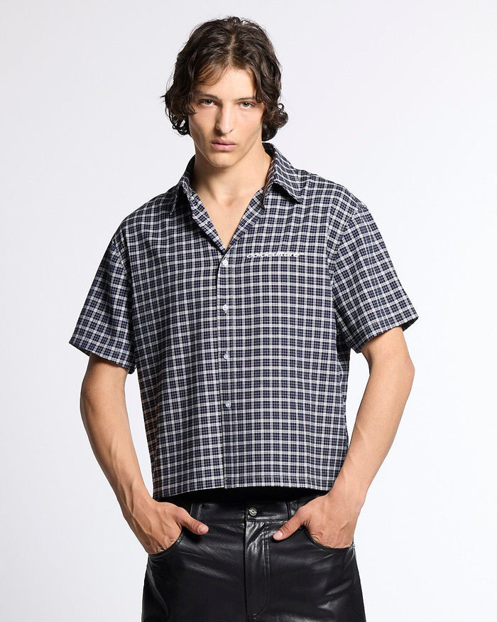 TARTAN SCRIPT SHIRT BLACK - black plaid short sleeve shirt, front view on male model - Cold Culture