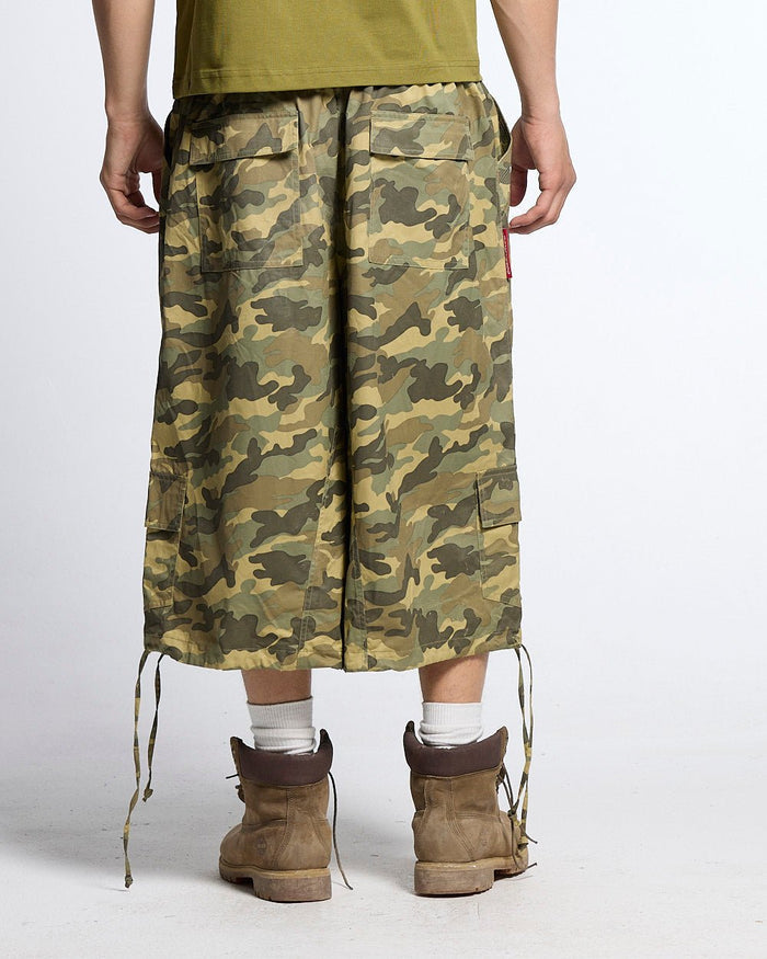 UTILITARY CAPRI PARACHUTE CAMO - camo cargo capri shorts, back view on male model - Cold Culture